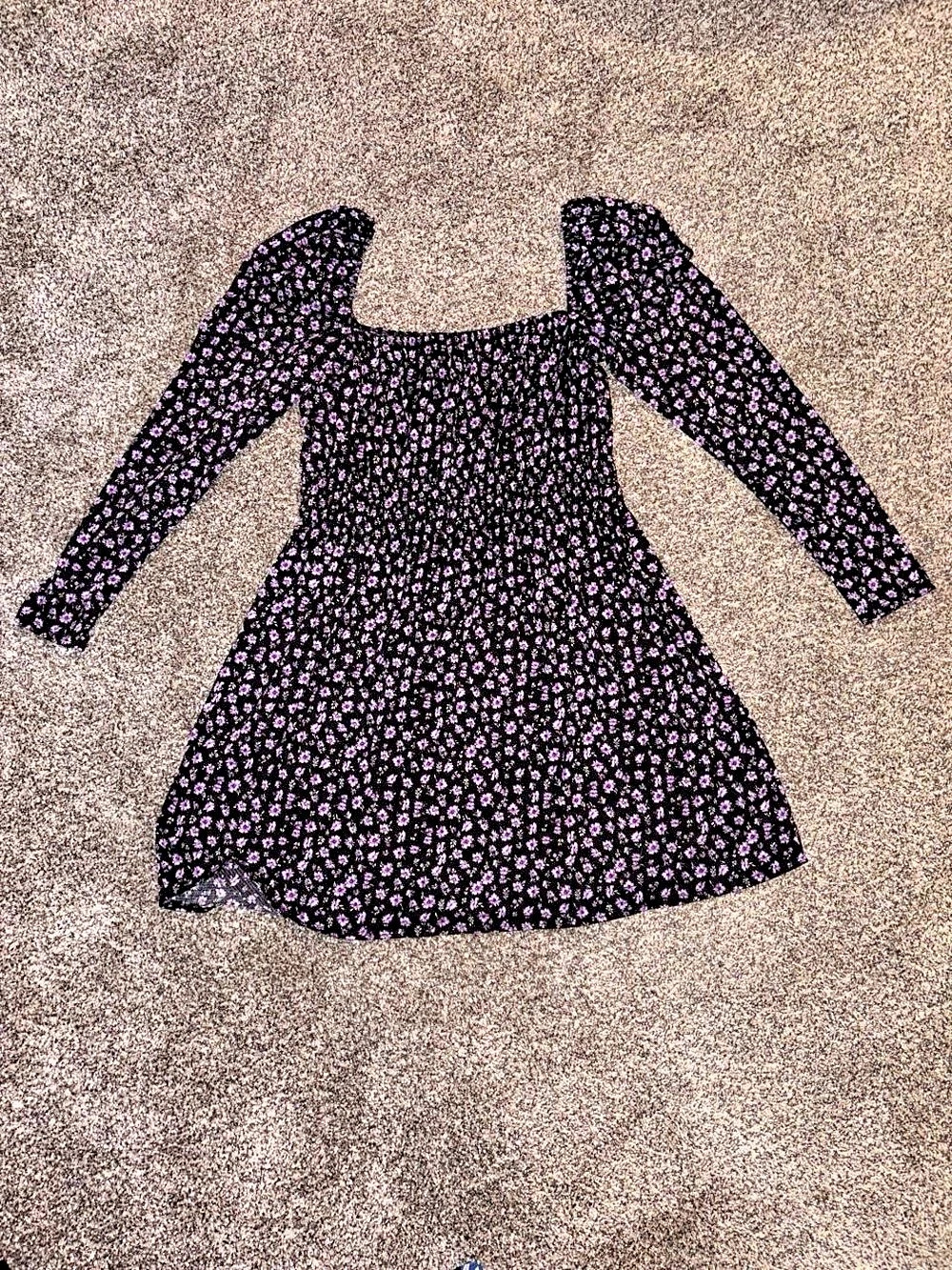 Black mini long sleeve dress with a purple floral whimsygoth design